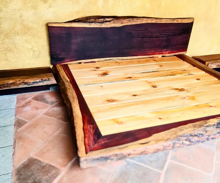 Live-edge platform bed frame with contrasting dark heartwood edge